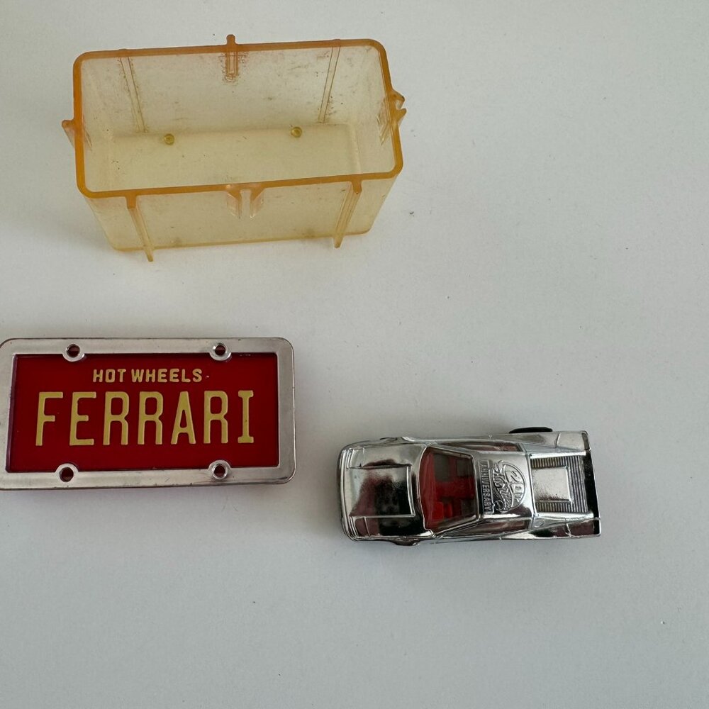Lot 064 – Hot Wheels/Small Toys.  Sold As Is.  Car and Box